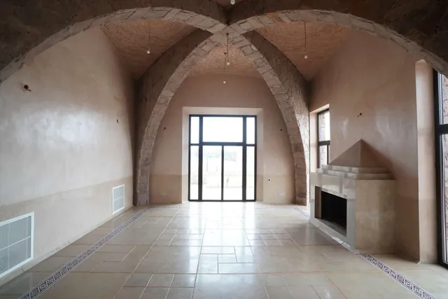 Villa des Chercheurs à Benguérir — construction en pierre pour l’UM6P / groupe OCP